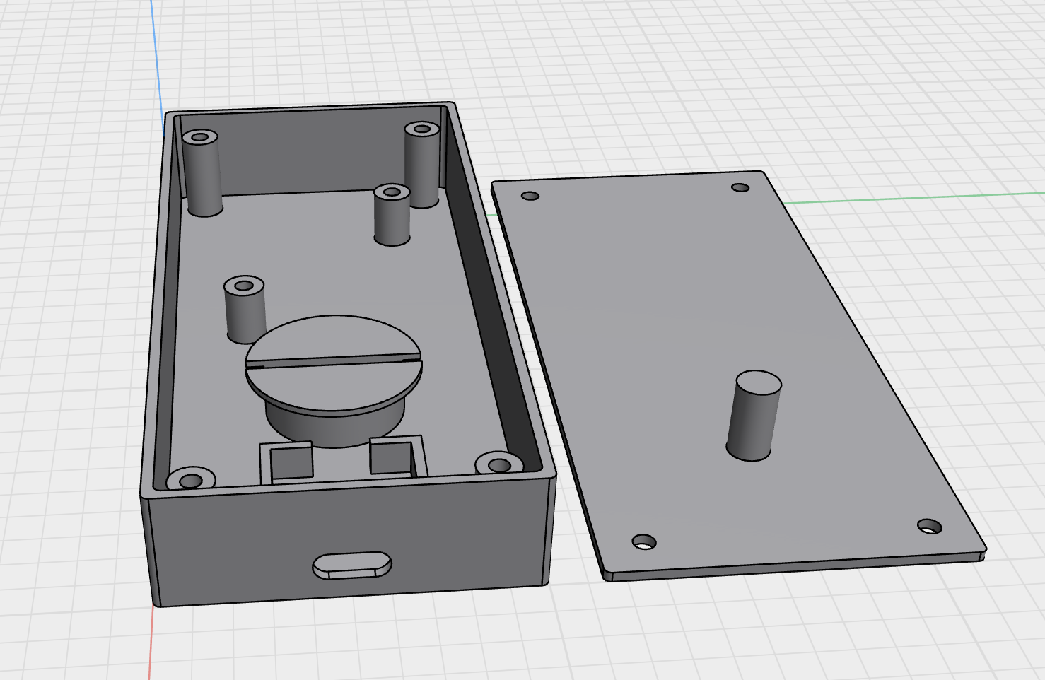 CAD rendering of the enclosure showing the box with its internal spool post and the lid with its support pin
